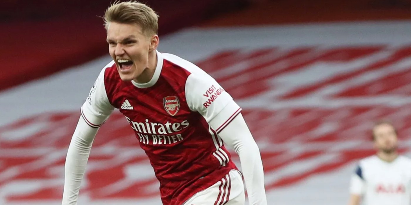 Martin Odegaard's penalty seals a nervy win for 10-man Arsenal